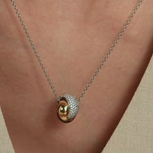 Load and play video in Gallery viewer, Bold Zirconia Crossover Necklace
