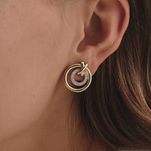 Load and play video in Gallery viewer, Contrast Crossover Circle Earrings

